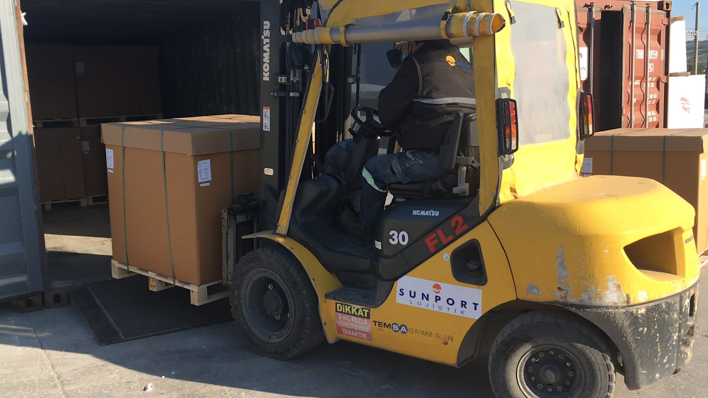 Yellow Forklift loading
